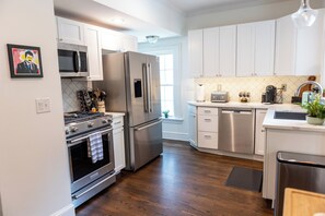 Microwave, oven, stovetop, dishwasher - Stylish 3 BR Home on Beltline w/ private office & fenced private courtyard (Atlanta)