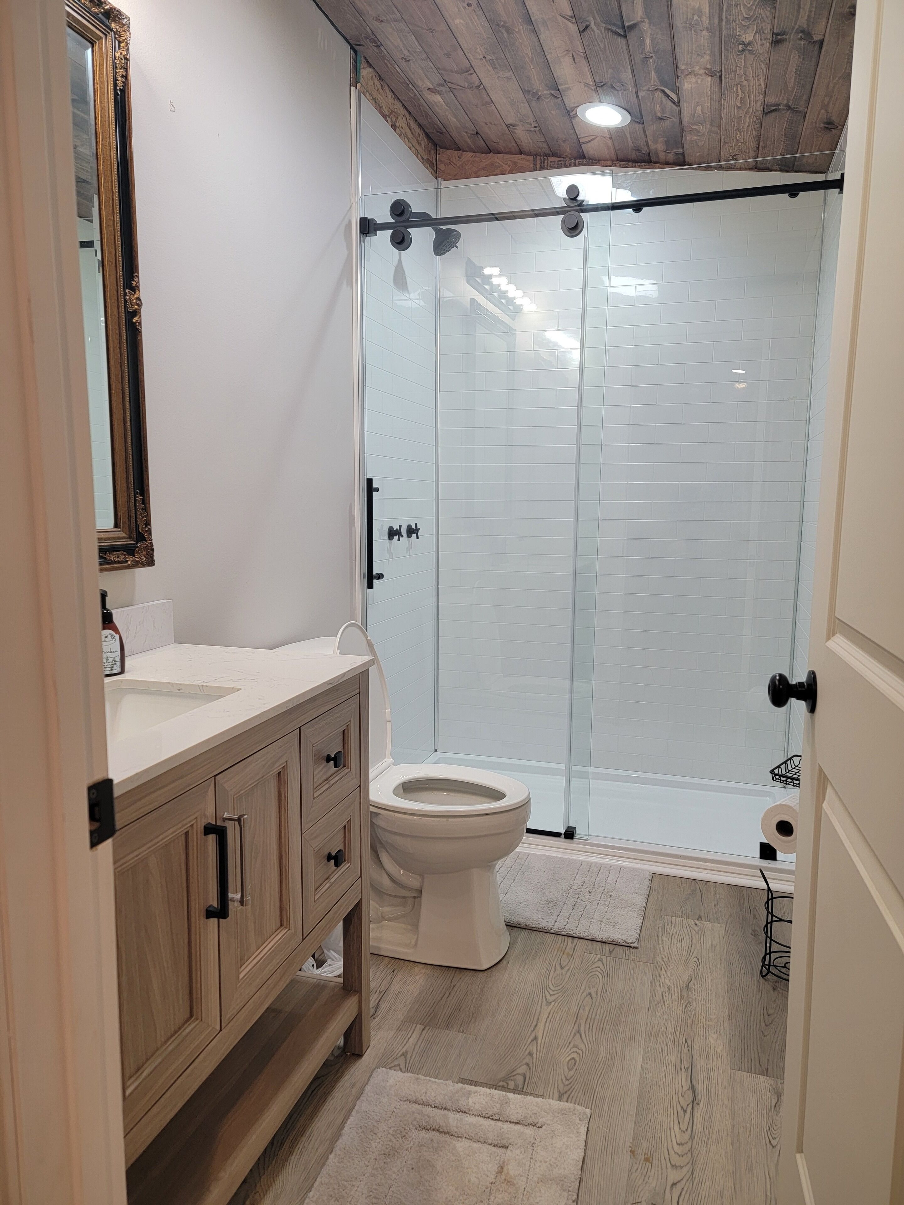 Shower, towels, toilet paper