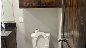 Hair dryer, towels, soap, toilet paper