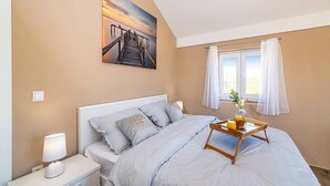 Casa | 4 habitaciones y tabla de planchar con plancha 