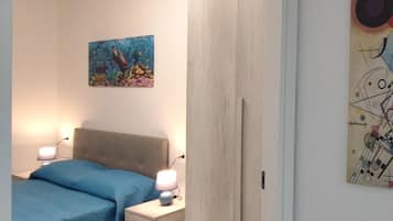 2 habitaciones, muebles diferentes y ropa de cama