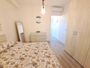 Apartamento | 2 quartos, individualmente mobiliados, roupa de cama