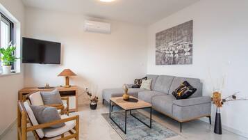 Ferienhaus | Wohnzimmer | Kamin