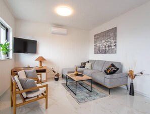 Ferienhaus | Wohnzimmer | Kamin