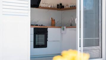 House | Private kitchen | High chair, cleaning supplies