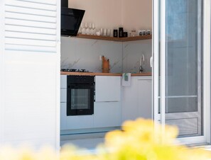 House | Private kitchen | Highchair, cleaning supplies - Beachfront Holiday Home in Kosljun (Pag)