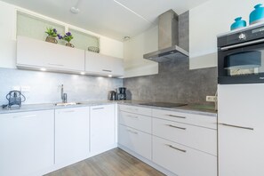 Apartment | Private kitchen - Comfortable 4-person Apartment With Terrace and View (De Koog)