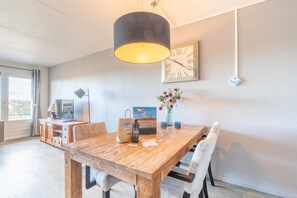 Apartment | Living room - Comfortable 4-person Apartment With Terrace and View (De Koog)