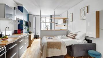1 bedroom, desk, iron/ironing board, travel cot