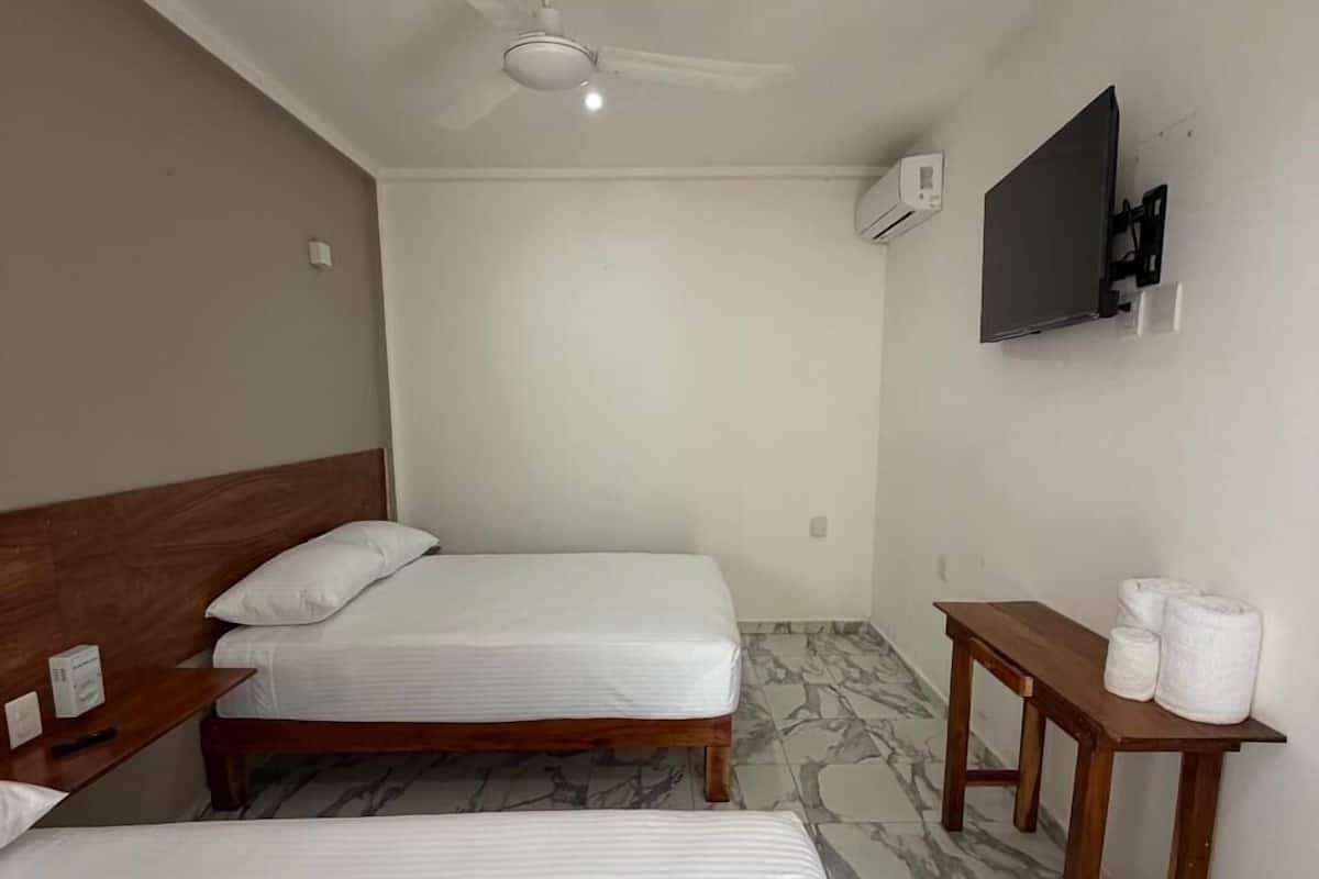 Comfort Quadruple Room, Courtyard View | Iron/ironing board, free WiFi