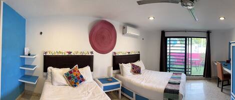 Habitación cuádruple Deluxe, 2 camas matrimoniales, vista a la ciudad