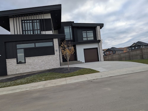 A brand new 2 bedroom walkout legal basement suite in Upper Greenwich NW Calgary