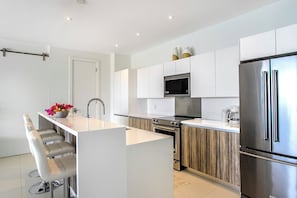 Fridge, microwave, oven, stovetop - Indigo Bay Oceanfront Escape 2BR Luxury Condo with Private Pool (Indigo Bay)