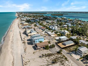 A coastal residential area with beachfront properties, roads, and a marina. - Seahorse Cottage 2 - 2/2 with Private Beach (Englewood)
