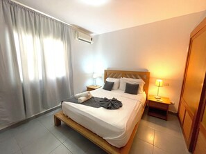 Suite presidencial, 1 habitación, alberca privada, vista al jardín | Caja de seguridad en la habitación, wifi gratis y ropa de cama 