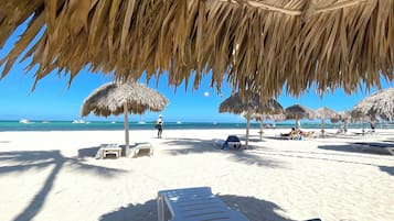 On the beach, white sand, 4 beach bars