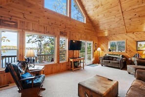 TV, fireplace, books - 4BR Lakefront Home | Kayaks, Fire Pit & Views (Hawks)