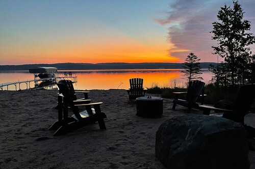 Lakeside luxury Home—dock, firepit, and easy access to Michigan’s best towns!