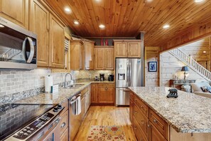 Fridge, microwave, oven, stovetop - Centrally located upscale cabin with mountain views, pool table & dog-friendly! (Seven Devils)