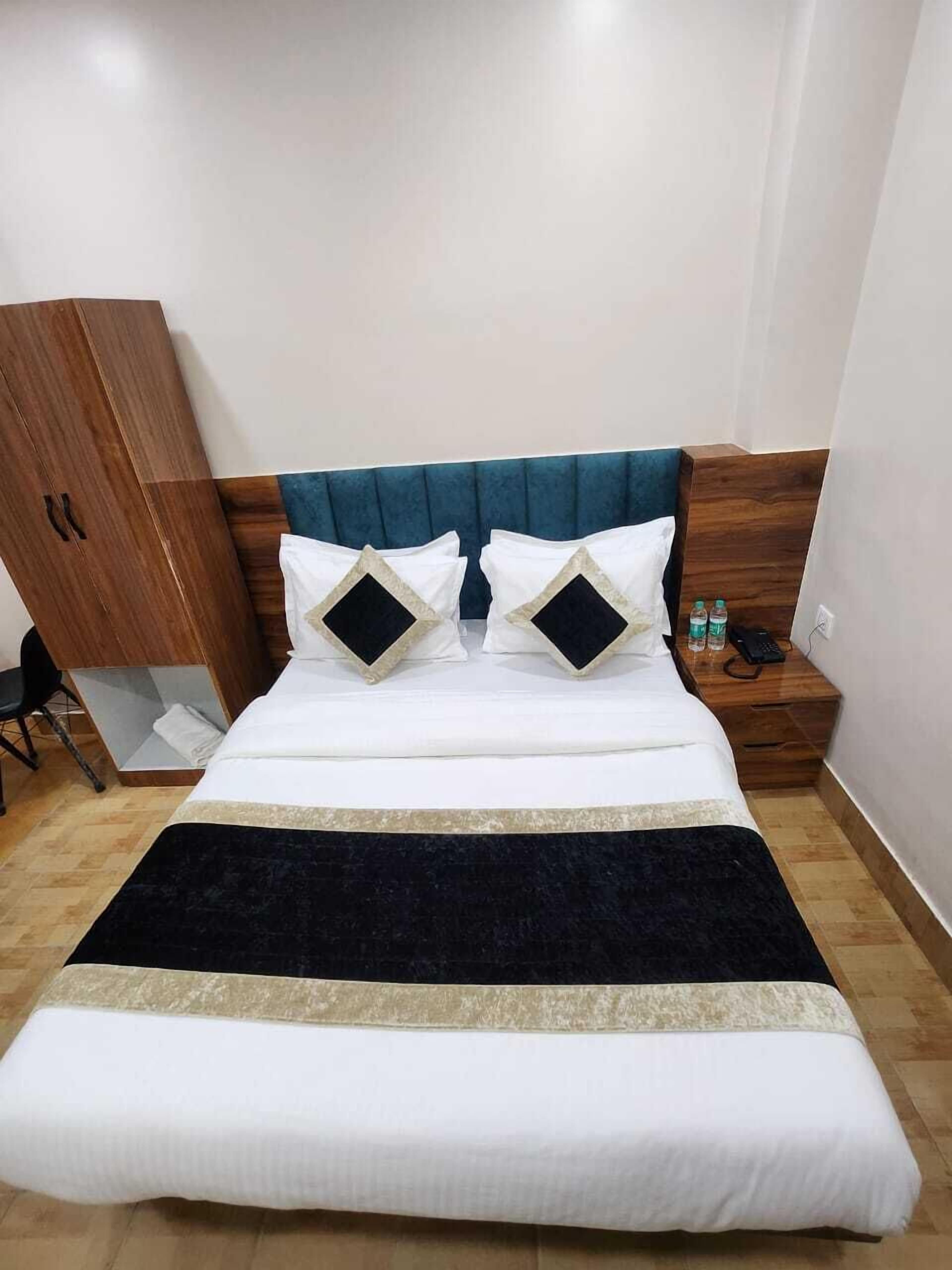 Luxury Triple Room, City View | Desk, laptop workspace