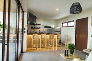 Full-size fridge, microwave, stovetop, electric kettle