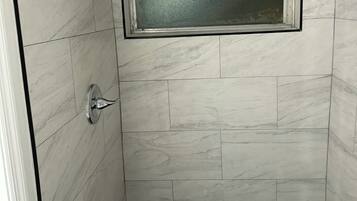 Shower, towels, toilet paper