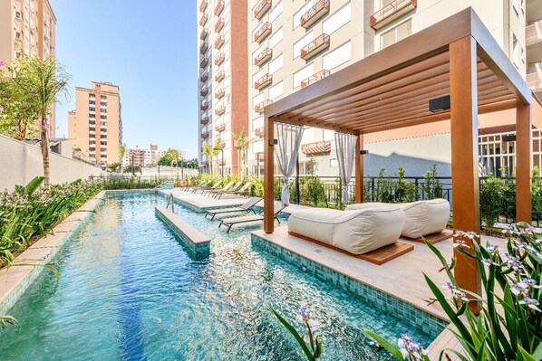 Outdoor pool - Your apartment just steps from PUC-RS and São Lucas Hospital! Free parking, swimming pool, coworking space. (Porto Alegre)