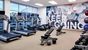 A gym with treadmills, elliptical machines, and weightlifting equipment. - SpringHill Suites by Marriott Bryce Canyon (Bryce Canyon)
