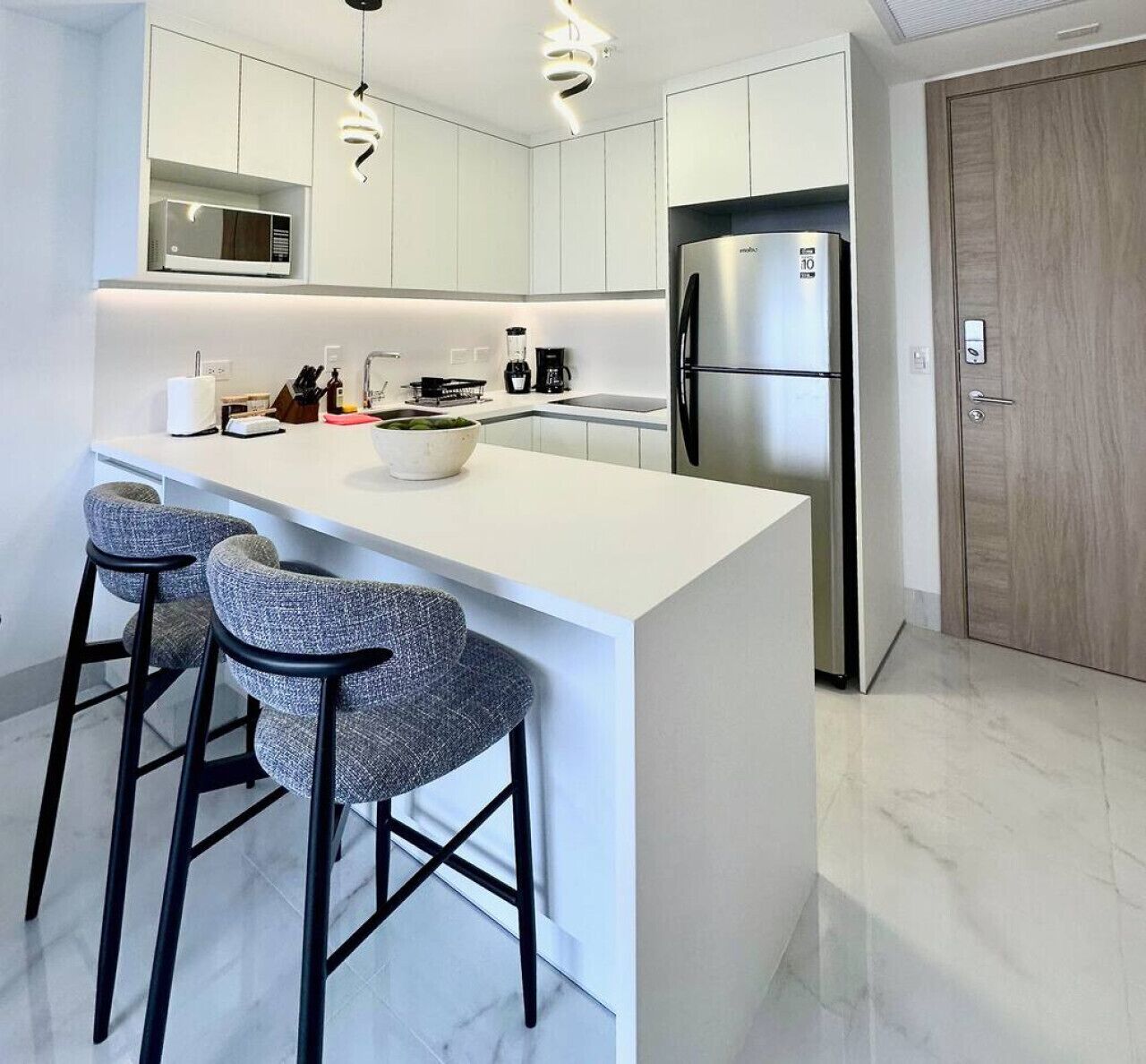 Fridge, microwave, stovetop, coffee/tea maker