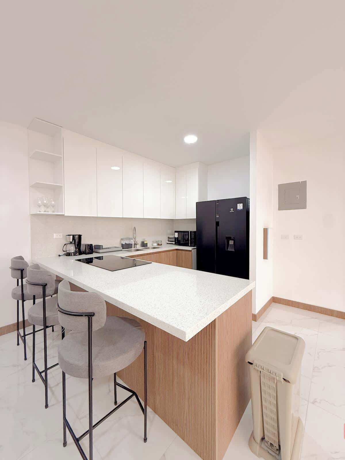 Fridge, microwave, stovetop, coffee/tea maker