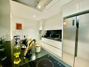 Fridge, microwave, stovetop, coffee/tea maker