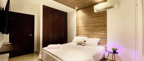 2 habitaciones, tabla de planchar con plancha, cuna de viaje y wifi
