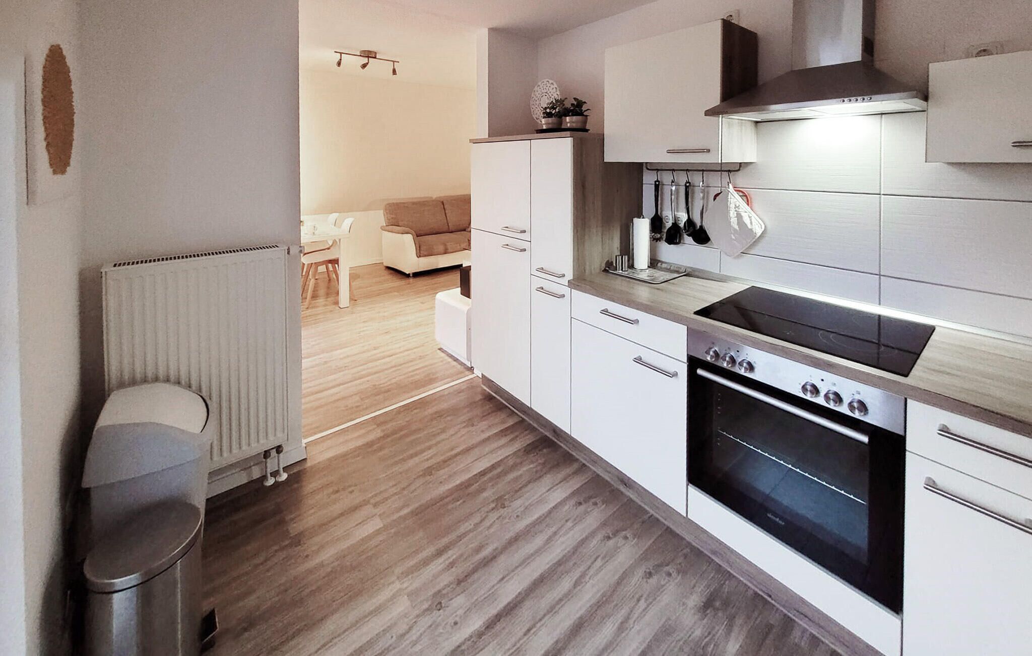 Fridge, stovetop, dishwasher, coffee/tea maker