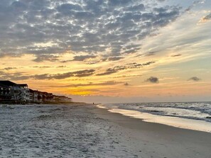 A beach with a sunset, buildings along the shore, and a clear sky. - One - Too - Suite, Saint George Island, Beach Townhome (Eastpoint)