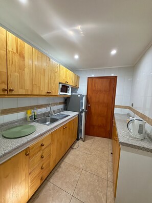 Private kitchen - Casa Tuwa Cabañas en pucón (Pucón)