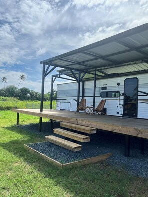 Property grounds - Cozy 2-bedroom RV in beautiful Jobos with AC (Jobos)
