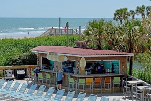 Outdoor dining - Modern Oceanfront Couple Retreat | (Myrtle Beach)
