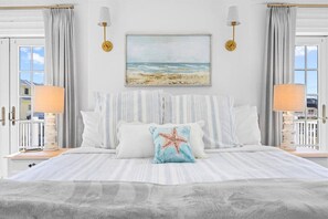 Escritorio, tabla de planchar con plancha, wifi y ropa de cama 