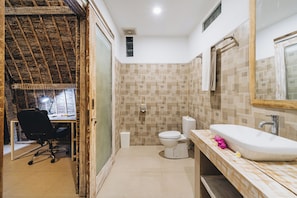Room, 1 Queen Bed, Balcony | Bathroom | Shower, free toiletries, towels, soap - Sunshine Village Canggu (Badung)