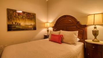 Tabla de planchar con plancha, wifi gratis y ropa de cama