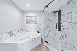 Shower, jetted bath, hair dryer, towels - Beachfront Elegance | Updated Condo w/ Balcony Views & Pool Access | BEACHBALL PROPERTIES (Gulf Shores)