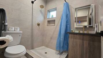 Hair dryer, towels, soap, shampoo