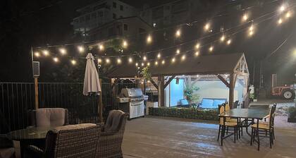 Hillside cottage with city lights and sunset views.Near Disneyland.