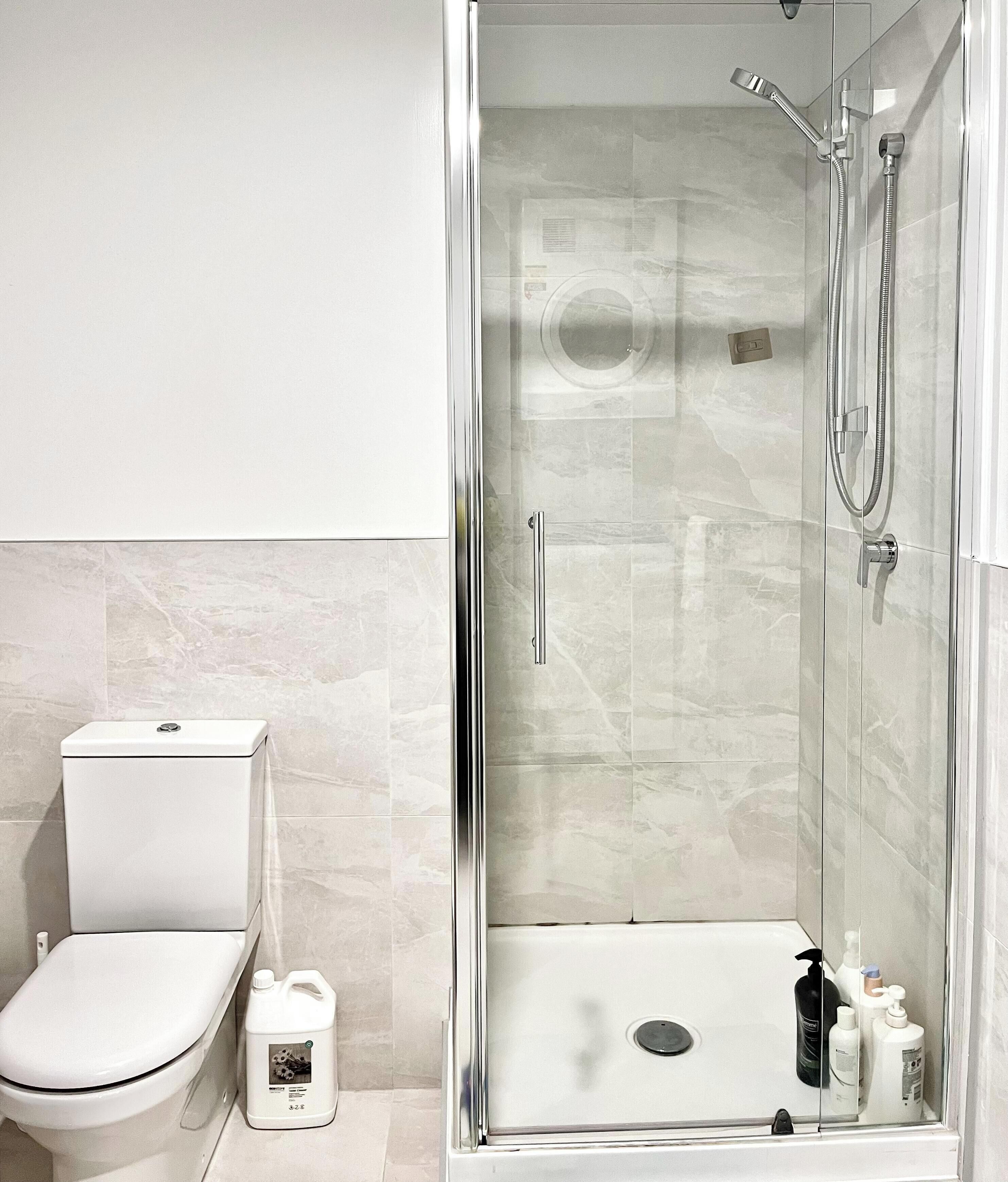 Shower, hair dryer, towels, soap