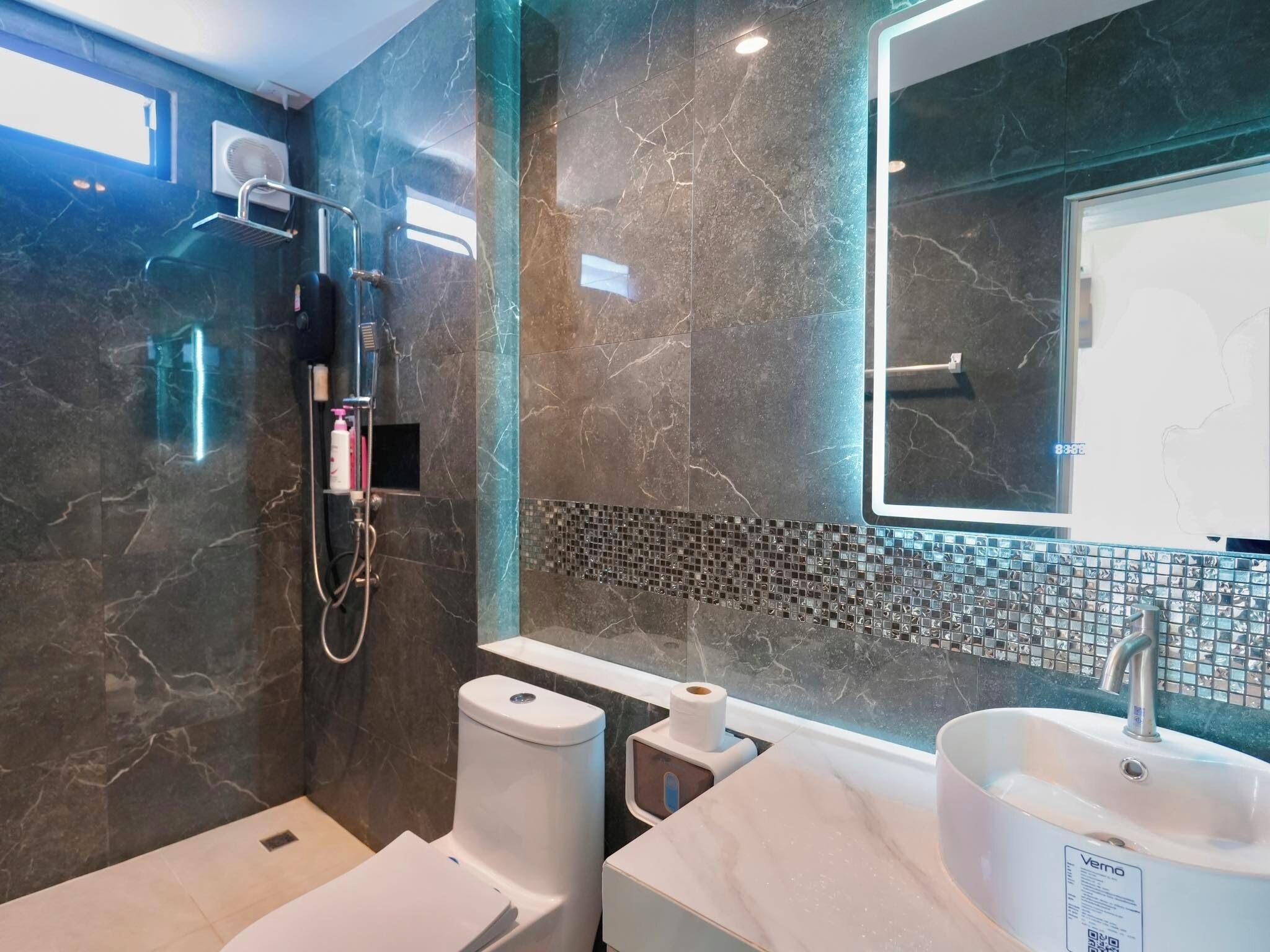 Shower, jetted tub, hair dryer, bidet