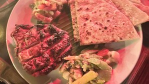 A plate with grilled steak, tortillas, and a vegetable dish. - Senbo Eco Resort Cox's Bazar (Cox's Bazar)