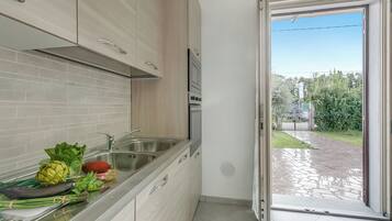 Family House, Multiple Bedrooms, Refrigerator & Microwave (Casa Nadia 1.2 Km from Sea/Near) | Private kitchen | Fridge, microwave, oven, stovetop