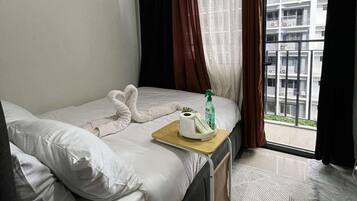 Signature Condo, 1 Bedroom, Balcony, Pool View | In-room safe, individually decorated, individually furnished, free WiFi