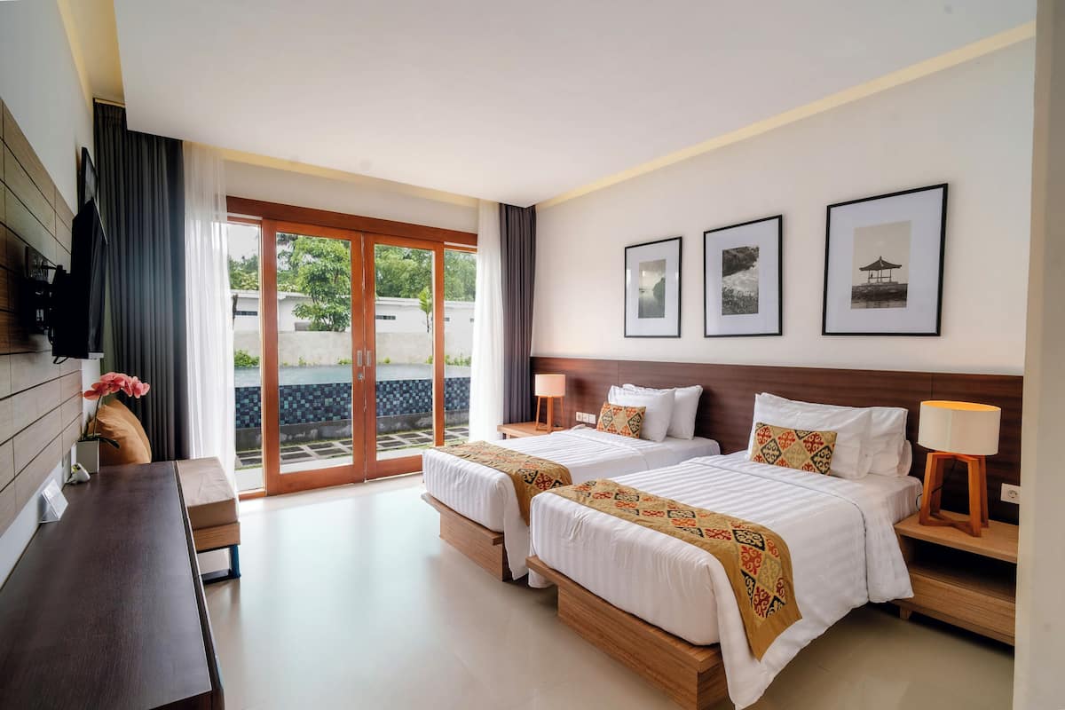 Chambre Deluxe, non-fumeur, vue sur la piscine | Minibar, systĂšme dâinsonorisation, accĂšs au Wi-Fi (inclus)