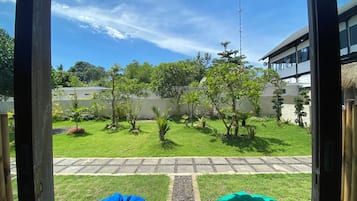 Habitación Deluxe, no fumadores, vistas al jardín | Terraza o patio